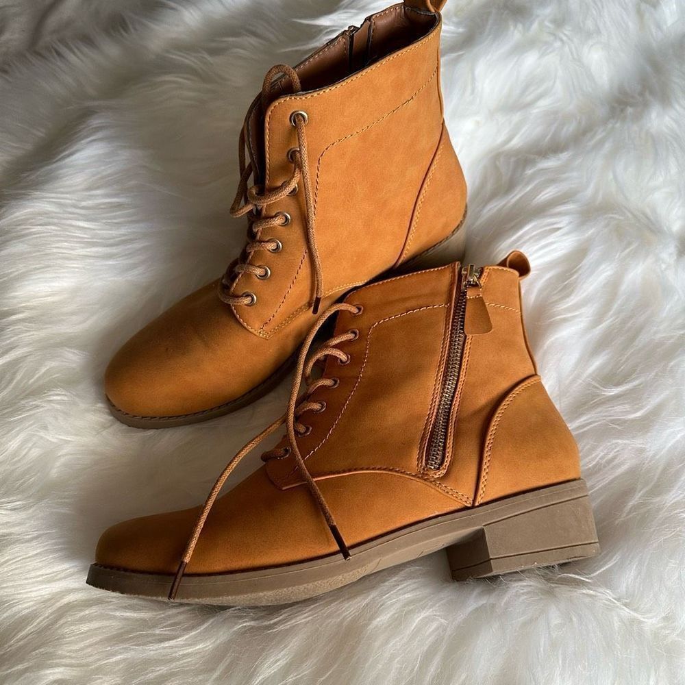Modern Rash tan woman’s fashion boots , zippered sides, lace up
